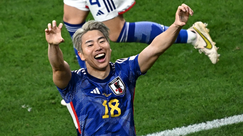Selebrasi pencetak gol Jepang, Takumi Asano saat melawan Jerman di Stadion Internasional Khalifa, Rabu (23/11) malam WIB.