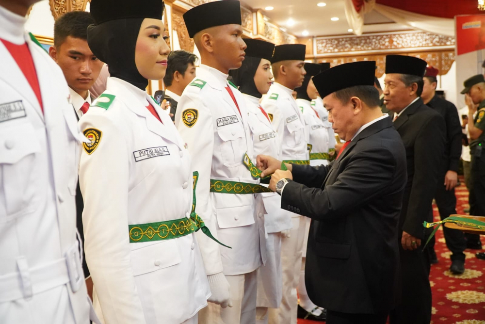 Pengukuhan Calon Paskibraka Provinsi Jambi Tahun 2023, bertempat di Auditorium Rumah Dinas Gubernur Jambi, Selasa (15/08/2023) Malam.