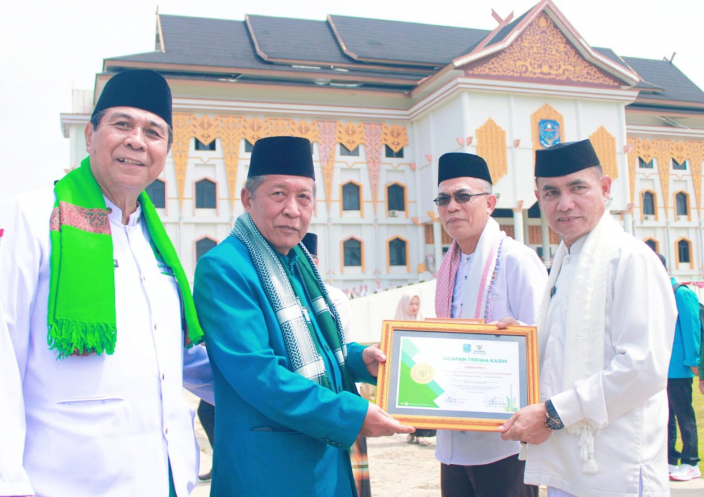Wakil Gubernur Jambi Abdullah Sani menghadiri peringatan hari santri nasional 2025 di Merangin. 
